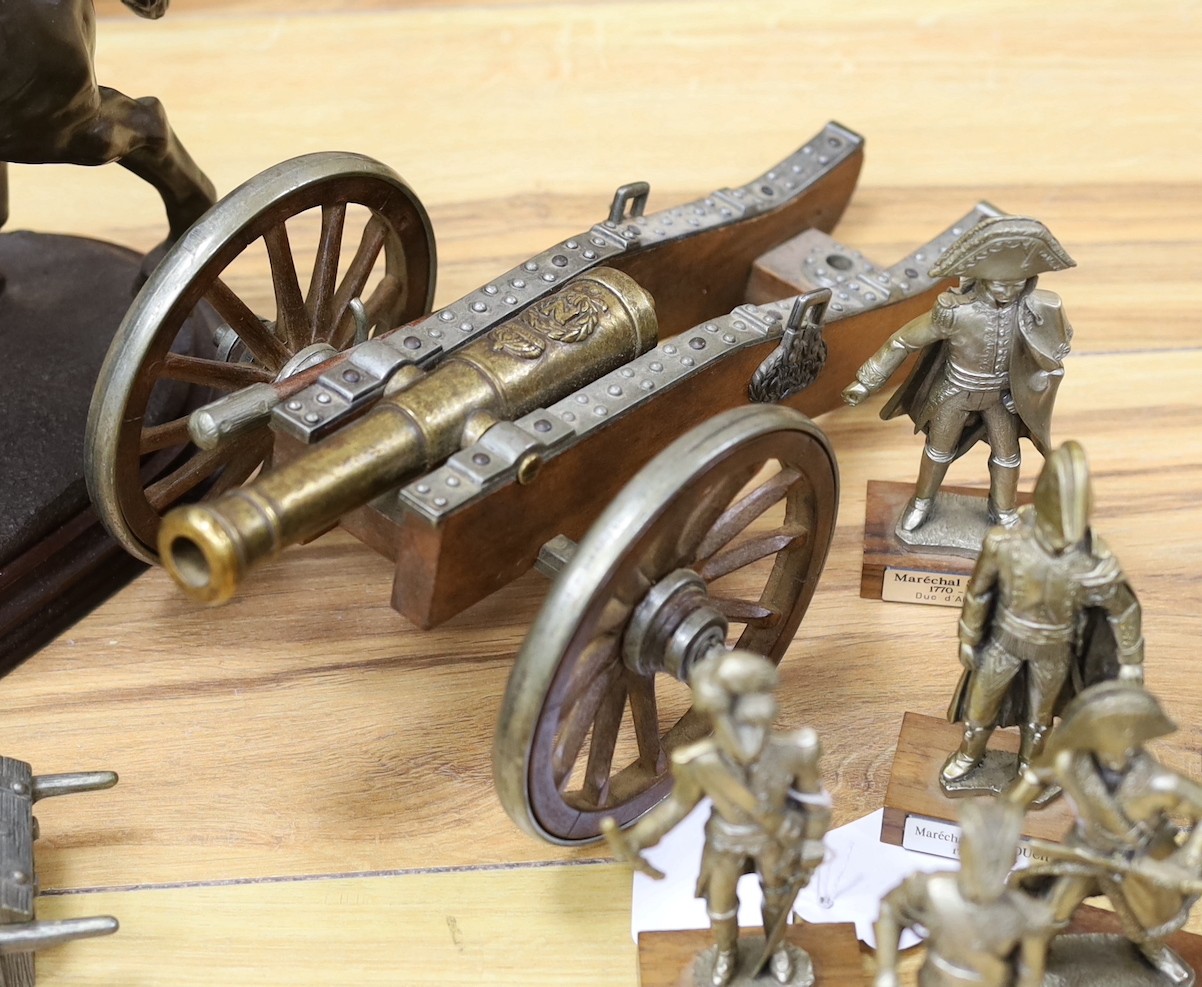 Duke of Wellington and Napoleonic war interest – a group of composition and ceramic figures of soldiers, a model of a cannon, a composition group of Wellington on horseback etc.